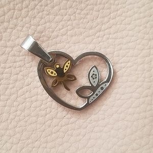 Heart shaped pendant with butterflys inside